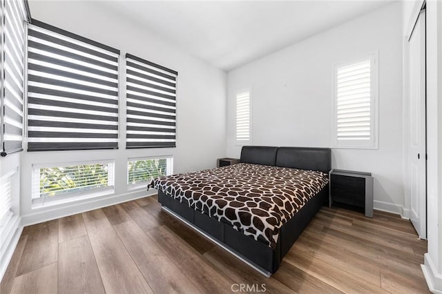 27 Alessio, Lake Forest, CA 92630 - bedroom with hardwood / wood-style flooring and a closet