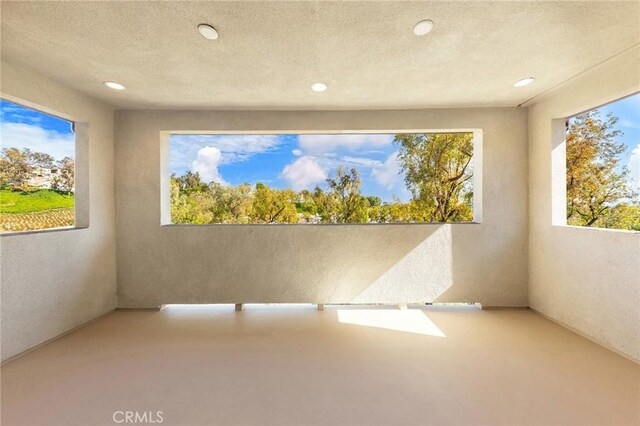 27 Alessio, Lake Forest, CA 92630 - unfurnished room featuring recessed lighting and a textured wall