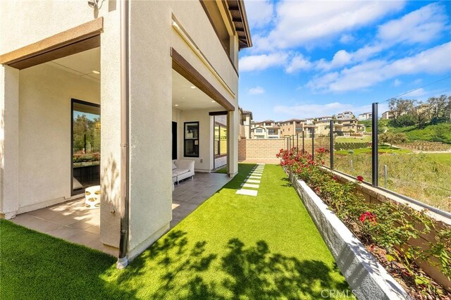 27 Alessio, Lake Forest, CA 92630 - view of yard featuring a patio