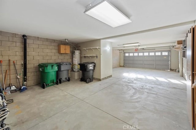975 Manor Way, Corona, CA 92882 - garage with secured water heater and concrete block wall