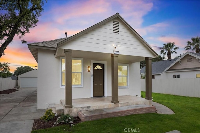 3882 Taft St, Riverside, CA 92503 - bungalow-style home featuring covered porch, a garage, and stucco siding
