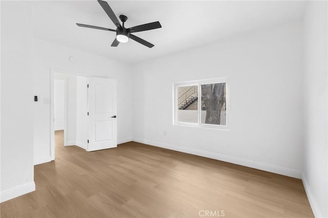 3882 Taft St, Riverside, CA 92503 - unfurnished room with wood finished floors, baseboards, and ceiling fan
