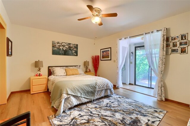 44800 Ahwahnee Acres Rd, Ahwahnee, CA 93601 - bedroom featuring access to outside, light wood-type flooring, baseboards, and ceiling fan