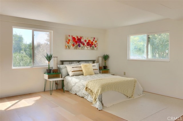 44800 Ahwahnee Acres Rd, Ahwahnee, CA 93601 - bedroom with multiple windows and wood finished floors