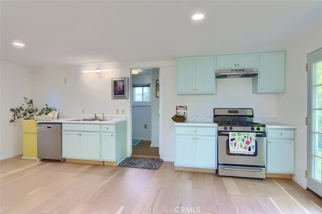 44800 Ahwahnee Acres Rd, Ahwahnee, CA 93601 - kitchen with stainless steel appliances, a sink, light wood-style floors, healthy amount of natural light, and recessed lighting
