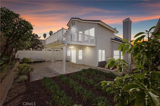 20815 E Rocky Point Ln, Walnut, CA 91789 - back of property with a balcony, a patio area, fence, and stucco siding