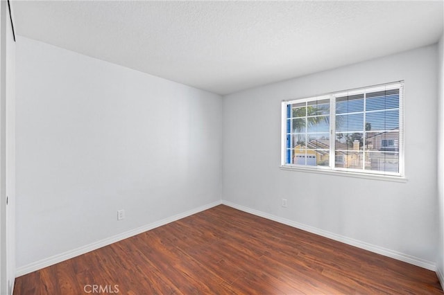 20815 E Rocky Point Ln, Walnut, CA 91789 - empty room with dark wood finished floors and baseboards