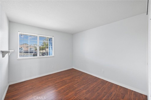 20815 E Rocky Point Ln, Walnut, CA 91789 - spare room featuring wood finished floors, baseboards, and a textured ceiling