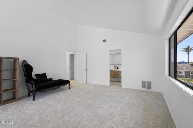 3960 W Hemlock St, Oxnard, CA 93035 - living area featuring high vaulted ceiling, carpet flooring, and baseboards