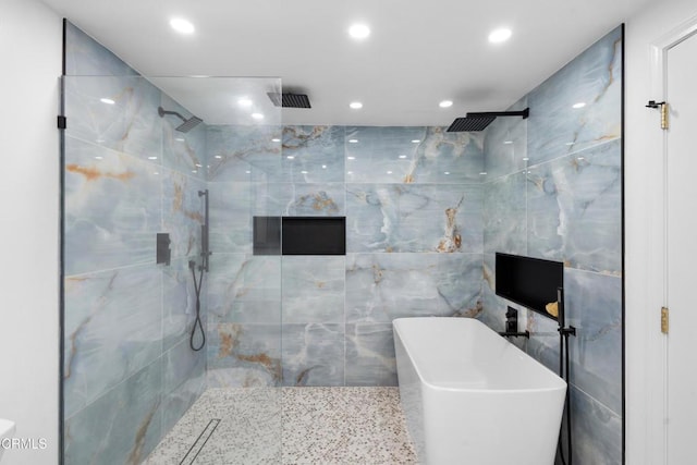 3960 W Hemlock St, Oxnard, CA 93035 - bathroom with a marble finish shower, recessed lighting, and a freestanding tub