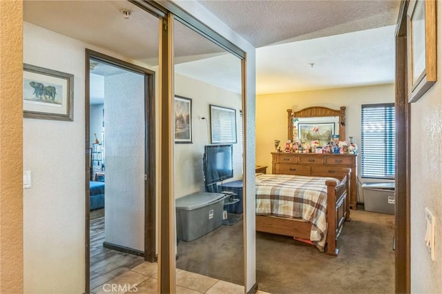 12584 Atwood Ct Unit 412, Rancho Cucamonga, CA 91739 - carpeted bedroom with a textured wall and a textured ceiling