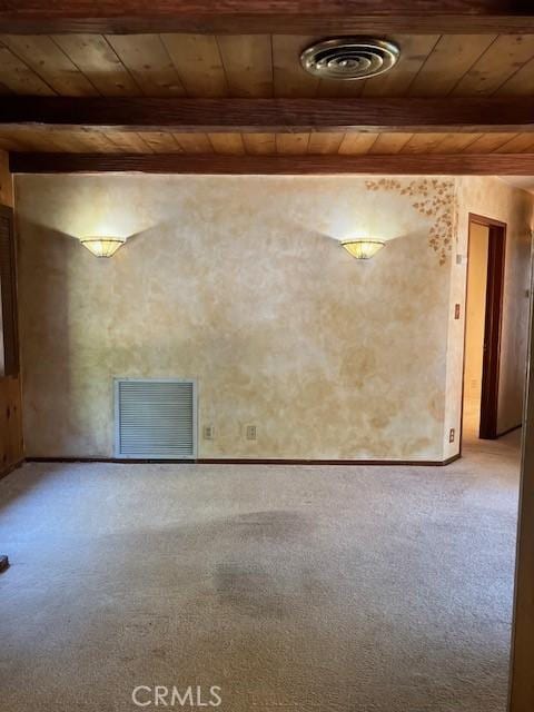 9656 Green Verdugo Dr, Shadow Hills, CA 91040 - carpeted empty room featuring wood ceiling, beamed ceiling, and baseboards
