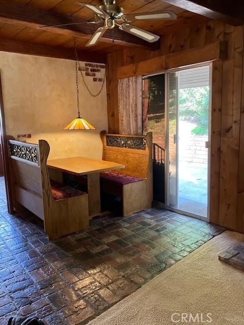 9656 Green Verdugo Dr, Shadow Hills, CA 91040 - dining room featuring wooden walls, a ceiling fan, brick flooring, and wood ceiling