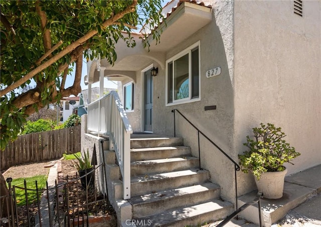 827 S Leland St, San Pedro, CA 90731 - property entrance featuring fence and stucco siding