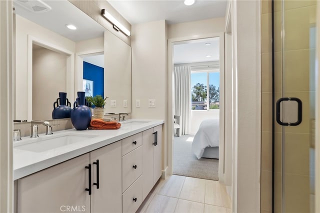 19041 Main St Unit 109, Huntington Beach, CA 92648 - ensuite bathroom with a stall shower, double vanity, recessed lighting, and tile patterned flooring