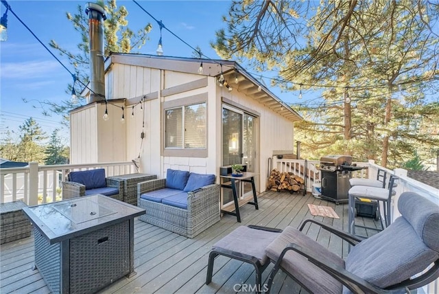 32490 Scandia Dr, Running Springs, CA 92382 - deck with a grill and an outdoor hangout area
