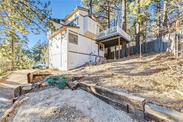32490 Scandia Dr, Running Springs, CA 92382 - back of house with a deck and fence