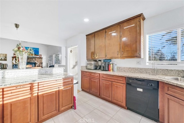 32490 Scandia Dr, Running Springs, CA 92382 - kitchen with black dishwasher, plenty of natural light, light tile patterned floors, brown cabinetry, and recessed lighting