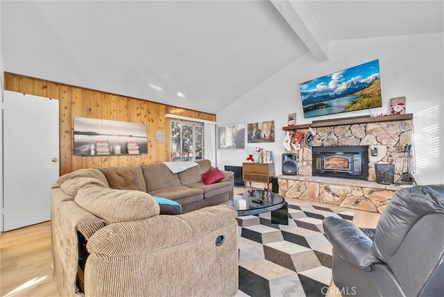 32490 Scandia Dr, Running Springs, CA 92382 - living room featuring wood walls, light wood-type flooring, and a wood stove