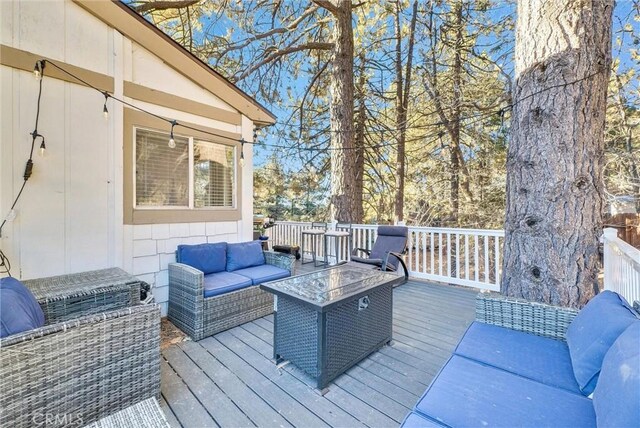 32490 Scandia Dr, Running Springs, CA 92382 - deck with an outdoor hangout area