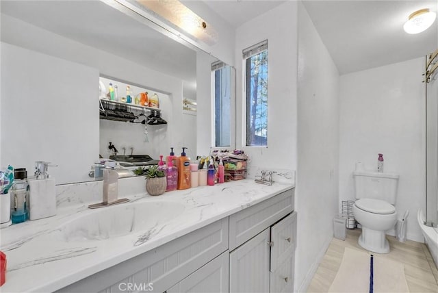32490 Scandia Dr, Running Springs, CA 92382 - bathroom with toilet, vanity, and wood finished floors