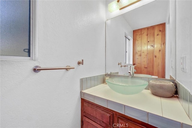 32490 Scandia Dr, Running Springs, CA 92382 - bathroom featuring vanity and a textured wall