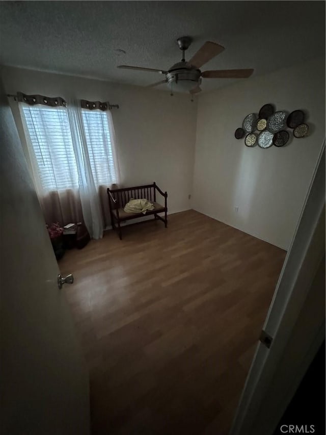 4521 Southern Breeze Dr, Bakersfield, CA 93313 - unfurnished room featuring ceiling fan, wood finished floors, and a textured ceiling