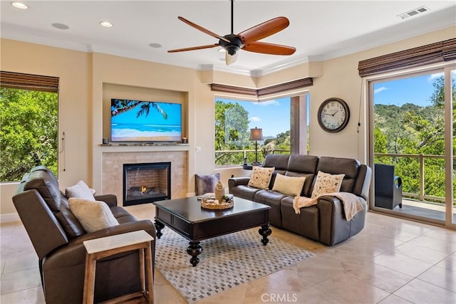 2815 Rock Wren Ln, Avila Beach, CA 93424 - living room with plenty of natural light, ceiling fan, a tile fireplace, ornamental molding, and recessed lighting