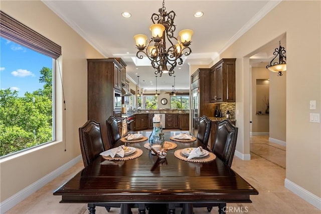 2815 Rock Wren Ln, Avila Beach, CA 93424 - dining area featuring a chandelier, recessed lighting, crown molding, and baseboards
