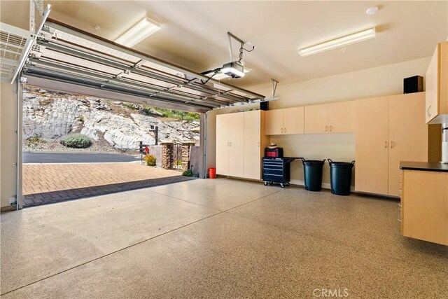 2815 Rock Wren Ln, Avila Beach, CA 93424 - garage featuring a garage door opener