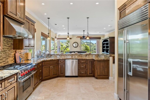 2815 Rock Wren Ln, Avila Beach, CA 93424 - kitchen featuring high quality appliances, under cabinet range hood, a sink, decorative backsplash, and ornamental molding