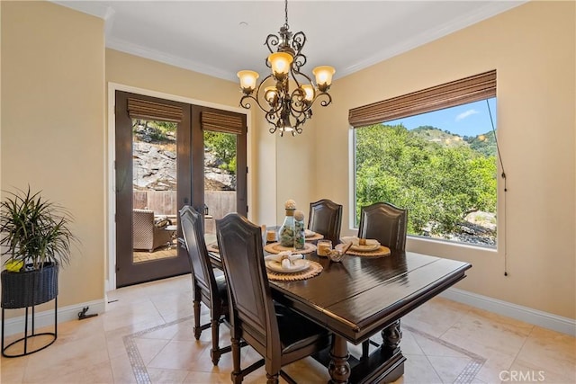 2815 Rock Wren Ln, Avila Beach, CA 93424 - dining area featuring inlaid floor details, french doors, light tile patterned floors, baseboards, and crown molding