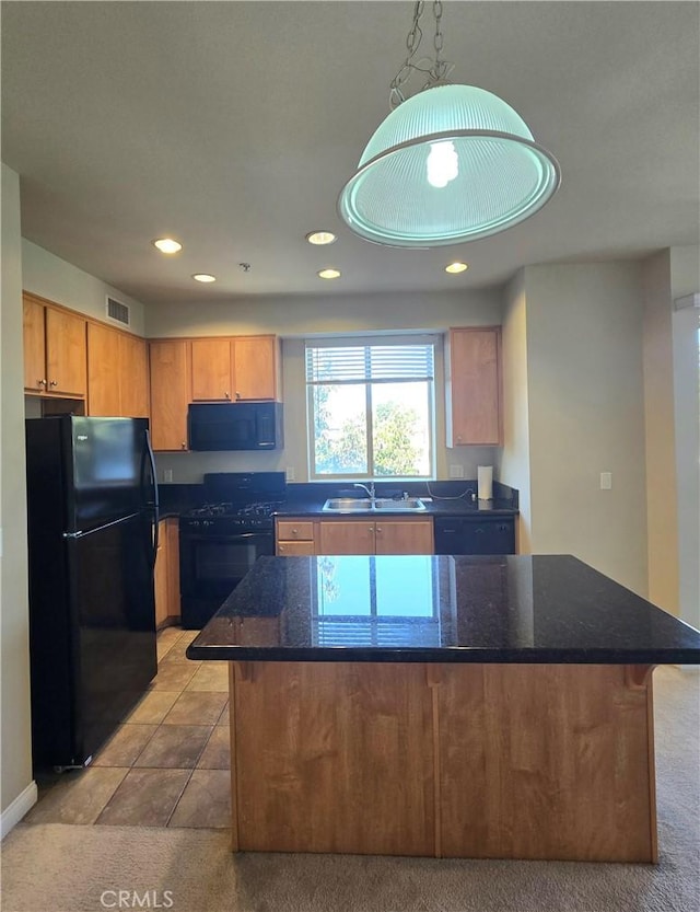 2742 Cabrillo Ave Unit 201, Torrance, CA 90501 - kitchen with black appliances, a sink, recessed lighting, light colored carpet, and a center island