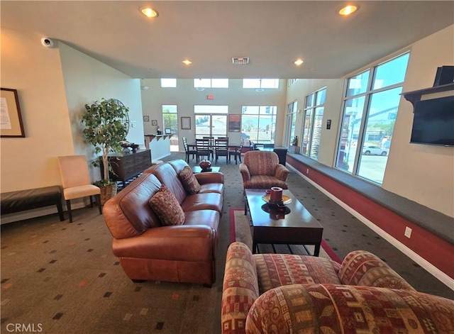 2742 Cabrillo Ave Unit 201, Torrance, CA 90501 - carpeted living room featuring recessed lighting, healthy amount of natural light, and baseboards