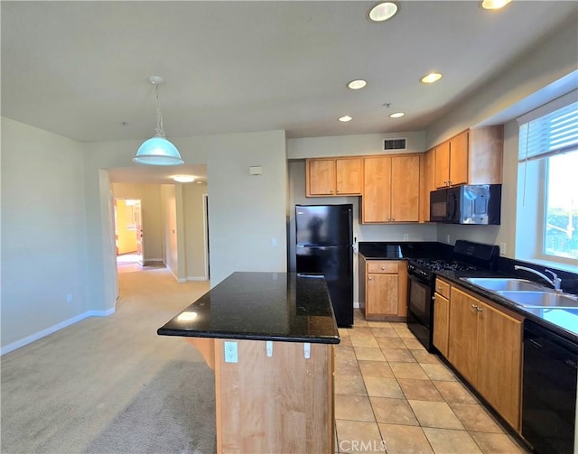 2742 Cabrillo Ave Unit 201, Torrance, CA 90501 - kitchen with black appliances, a sink, a kitchen island, recessed lighting, and decorative light fixtures
