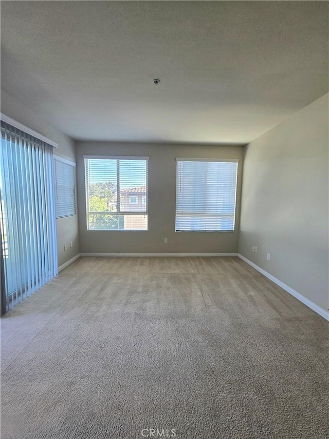 2742 Cabrillo Ave Unit 201, Torrance, CA 90501 - spare room with light carpet and baseboards