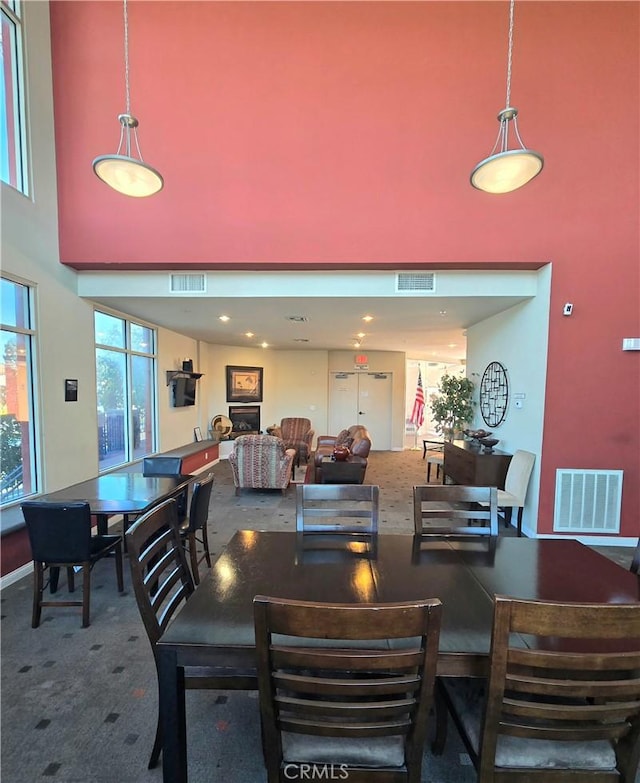 2742 Cabrillo Ave Unit 201, Torrance, CA 90501 - carpeted dining room with a towering ceiling
