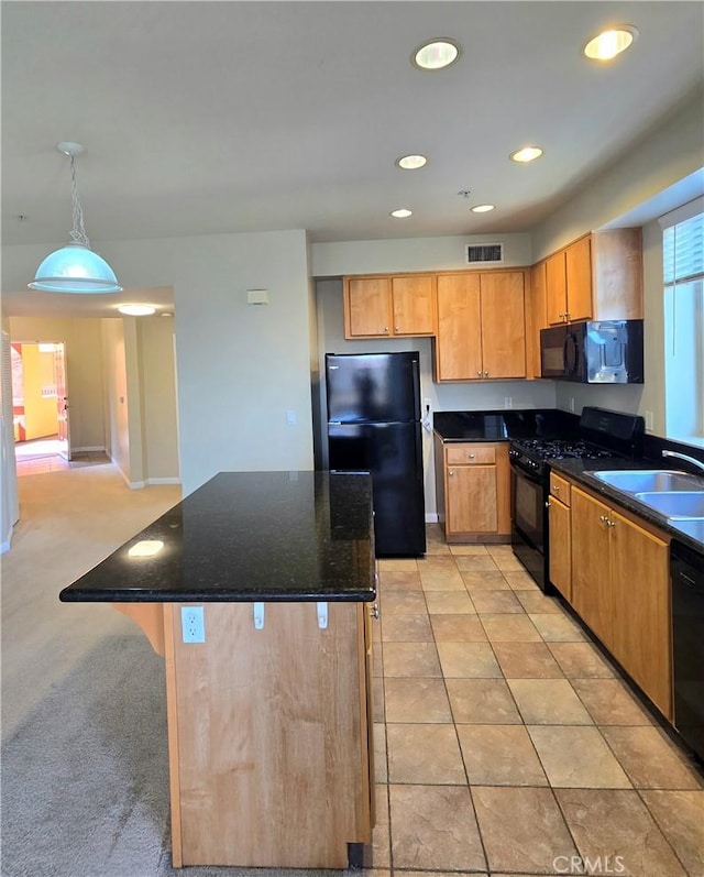 2742 Cabrillo Ave Unit 201, Torrance, CA 90501 - kitchen with black appliances, a sink, recessed lighting, a kitchen island, and hanging light fixtures