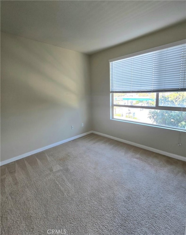 2742 Cabrillo Ave Unit 201, Torrance, CA 90501 - spare room featuring baseboards and carpet flooring