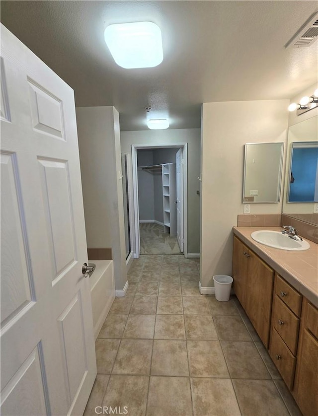 2742 Cabrillo Ave Unit 201, Torrance, CA 90501 - full bath with a stall shower, vanity, baseboards, and a bath