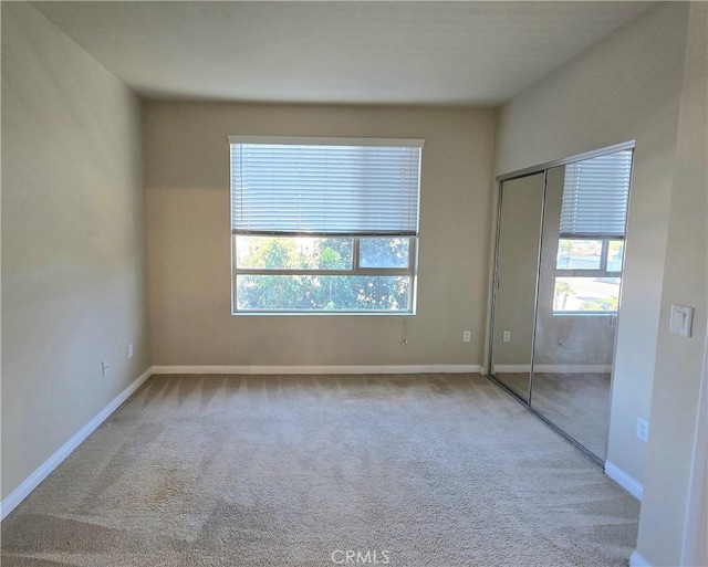 2742 Cabrillo Ave Unit 201, Torrance, CA 90501 - unfurnished bedroom featuring carpet flooring, baseboards, and a closet