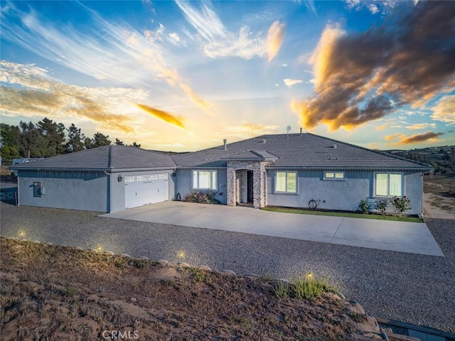 38550 Crossover Rd, Temecula, CA 92592 - single story home featuring concrete driveway, an attached garage, and stucco siding