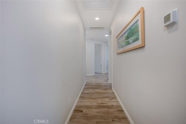 38550 Crossover Rd, Temecula, CA 92592 - hallway with light wood-style flooring, baseboards, and recessed lighting