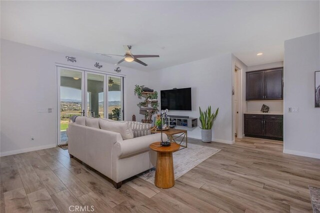 38550 Crossover Rd, Temecula, CA 92592 - living room with a ceiling fan, light wood-style flooring, baseboards, and recessed lighting