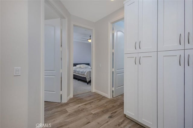 38550 Crossover Rd, Temecula, CA 92592 - hallway with light wood finished floors and baseboards