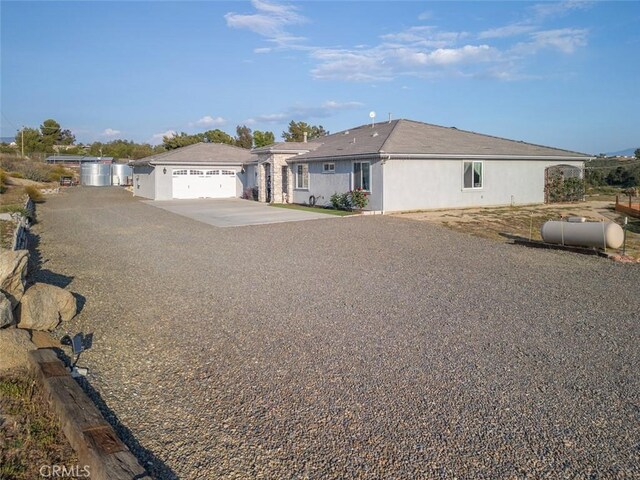 38550 Crossover Rd, Temecula, CA 92592 - ranch-style home with driveway and a garage