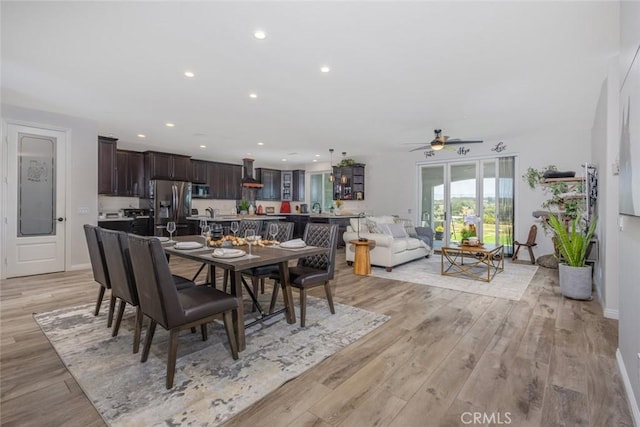38550 Crossover Rd, Temecula, CA 92592 - dining area with a ceiling fan, light wood-style floors, recessed lighting, and baseboards