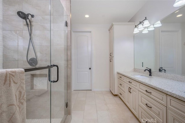 38550 Crossover Rd, Temecula, CA 92592 - bathroom featuring a stall shower, vanity, baseboards, and recessed lighting