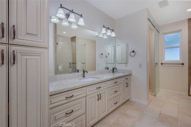 38550 Crossover Rd, Temecula, CA 92592 - full bathroom with a shower stall, double vanity, tile patterned flooring, and baseboards