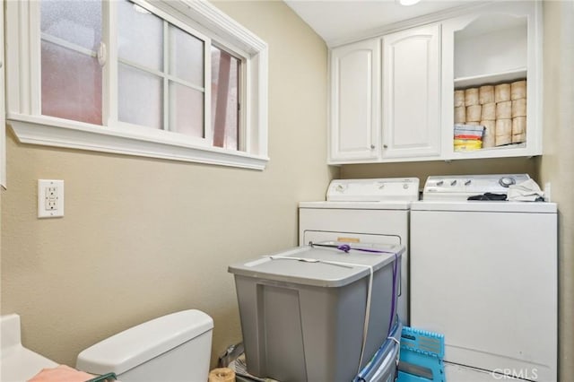 laundry room with washer and dryer